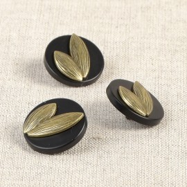 ROUND BLACK AND GOLD BUTTON