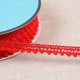 BORTE MIT KLEINEN POMPONS