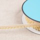 BORTE MIT KLEINEN POMPONS