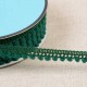 BORTE MIT KLEINEN POMPONS