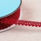 BORTE MIT KLEINEN POMPONS